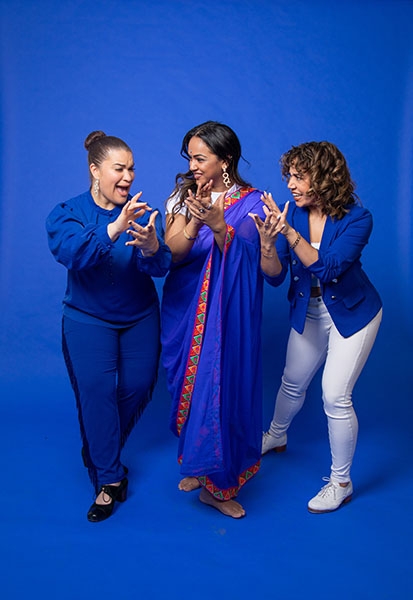 Dancers together on a blue background